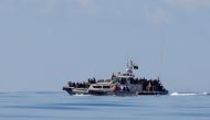 Migrants are seen onboard a Libyan Coast Guard vessel following a rescue operation in central Mediterranean Sea, January 31, 2018. Reuters/Alkis Konstantinidis