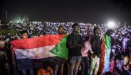 Sudanese protesters are gathered during a sit-in outside military headquarters after clashing with security forces in Khartoum on May 15, 2019.  AFP / Mohamed el-Shahed