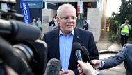 Australian Prime Minister Scott Morrison speaks to the media as he arrives at the Horizon Church in Sutherland in Sydney, Australia, May 19, 2019. AAP Image/Joel Carrett/via REUTERS 