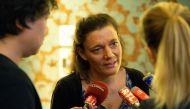 Nadege Dubois-Seex speaks with media representatives after a press conference in Paris on May 21, 2019, following hthe death of her husband Jonathan Seex, who was killed in an Ethiopian Airlines Boeing 737 Max 8 aircraft crash on March 10, 2019, on a flig