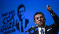 Turkish opposition candidate for the Istanbul re-run for the mayor's election, Ekrem Imamoglu gestures as he delivers a speech on stage during his repeated political campaign coordination meeting on May 22, 2019 in Istanbul.  AFP / OZAN KOSE