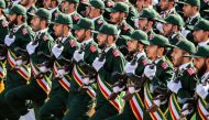 Iran Revolutionary Guards Corps march during the annual military parade marking the anniversary of the outbreak of the devastating 1980-1988 war with Iraq, Tehran, September 22, 2018. (AFP) 