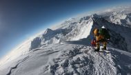 FILE PHOTO:  In this file photo taken on May 17, 2018, mountaineers make their way to the summit of Mount Everest, as they ascend on the south face from Nepal. AFP / Phunjo LAMA