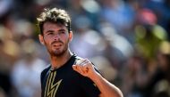Argentina's Juan Ignacio Londero celebrates after winning against France's Corentin Moutet at the end of their men's singles third round match on day six of The Roland Garros 2019 French Open tennis tournament in Paris on May 31, 2019. AFP / Anne-Christin