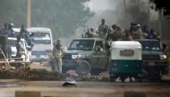 Sudanese forces are deployed around Khartoum's army headquarters on June 3, 2019 as they try to disperse Khartoum's sit-in.  / AFP / ASHRAF SHAZLY 