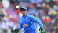 India's Mahendra Singh Dhoni fields during the 2019 Cricket World Cup group stage match between South Africa and India at the Rose Bowl in Southampton, southern England, on June 5, 2019.  AFP / Dibyangshu Sarkar