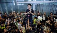 Pro-democracy activist Joshua Wong addresses the crowds outside the Legislative Council during a demonstration demanding Hong Kong's leaders to step down and withdraw the extradition bill, in Hong Kong, China, June 17, 2019. REUTERS/Thomas Peter