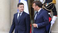Ukraine's President Volodymyr Zelensky (L) talks with French President Emmanuel Macron as he leaves the Elysee presidential palace following their meeting in Paris on June 17, 2019 in Paris. / AFP / ludovic MARIN