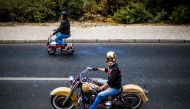 Bikers ride their Harley-Davidson motorbikes during the 28th annual Harley Davidson rally in Cascais on June 15, 2019. / AFP / PATRICIA DE MELO MOREIRA