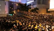 Protesters gather outside police headquarters in Hong Kong, China June 21, 2019. Reuters/Ann Wang
