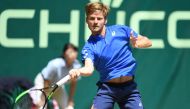 David Goffin from Belgium returns the ball during his match against Matteo Berrettini from Italy at the ATP tennis tournament in Halle, western Germany, on June 22, 2019. / AFP / CARMEN JASPERSEN
