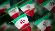 FILE PHOTO: Iran's national flags are seen on a square in Tehran February 10, 2012, a day before the anniversary of the Islamic Revolution. REUTERS/Morteza Nikoubazl
