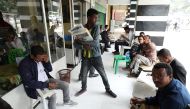 Ethiopians read newspapers in Addis Ababa, Ethiopia June 24, 2019. Reuters/Tiksa Negeri