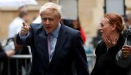 FILE PHOTO: Boris Johnson arrives at BBC studios to take part in a TV debate with candidates campaigning to replace British Prime Minister Theresa May, in London, Britain June 18, 2019. REUTERS/Peter Nicholls/File Photo