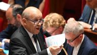 French Foreign Affairs Minister Jean-Yves Le Drian speaks during a session of questions to the government at the National Assembly in Paris on June 25, 2019. / AFP / DOMINIQUE FAGET