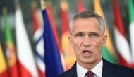 NATO Secretary General Jens Stoltenberg make a statement to the press at the doorstep at the NATO headquarters during a Defence Ministers meeting in Brussels on June 26, 2019. / AFP / JOHN THYS