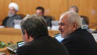 Iranian Foreign Minister Mohammad Javad Zarif (R) attending a cabinet meeting in the capital Tehran.  AFP 