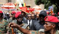 Ethiopia's deputy prime minister Demeke Mekonnen (C) attends the funeral of Amhara president Ambachew Mekonnen and two other officials who where killed in an attack in the town of Bahir Dar, Amhara region, Ethiopia June 26, 2019.  Reuters/Baz Ratner