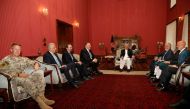 Secretary of State Mike Pompeo meets with, from left, Resolute Support NATO Base Commander Gen. Austin Scott Miller, Afghanistan Envoy Zalmay Khalilzad, U.S. Ambassador to Afghanistan John Bass, Pompeo, Afghan President Ashraf Ghani, Afghan Chief Executiv