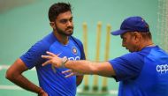India's head coach Ravi Shastri (R) talks with India's Vijay Shankar during a training session at Old Trafford in Manchester, northwest England on June 25, 2019, ahead of their 2019 Cricket World Cup group stage match against West Indies. AFP / Dibyangshu
