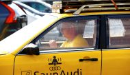 Willem Maesalu, inventor and owner of the old yellow Audi car converted into a small sauna, drives in the parking lot in Tallinn, Estonia June 27, 2019. Picture taken June 27, 2019. REUTERS/Ints Kalnins