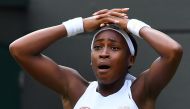 US player Cori Gauff celebrates beating US player Venus Williams during their women's singles first round match on the first day of the 2019 Wimbledon Championships at The All England Lawn Tennis Club in Wimbledon, southwest London, on July 1, 2019. AFP /