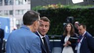 French President Emmanuel Macron (R) arrives for the EU leaders meeting to decide who should take over bloc’s top jobs, in Brussels, Belgium, 02 July 2019. (Dursun Aydemir - Anadolu Agency)