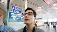 An Australian student Alek Sigley, 29, who was detained in North Korea, departs from Beijing to Japan, at the Beijing international airport, China, July 4, 2019. REUTERS/Jason Lee