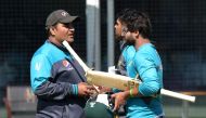 Pakistan's head coach Mickey Arthur (L) chats to Pakistan's Imam-ul-Haq attends a training session at Lord's cricket ground in London on July 4, 2019, ahead of their 2019 Cricket World Cup group stage match against Bangladesh. AFP / Oliver Greenwood 
