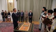 Leader of New Democracy conservative party and winner of Greek general election Kyriakos Mitsotakis is sworn in as prime minister during a ceremony at the Presidential Palace in Athens, Greece July 8, 2019. (REUTERS/Alkis Konstantinidis)