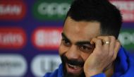 India's captain Virat Kohli addresses media representatives during a press conference at Old Trafford in Manchester, north-west England on July 8, 2019, ahead of their 2019 Cricket World Cup semi-final match against New Zealand. AFP / Dibyangshu Sarkar 