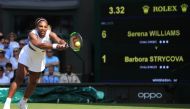US player Serena Williams returns against Czech Republic's Barbora Strycova during their women's singles semi-final match on day ten of the 2019 Wimbledon Championships at The All England Lawn Tennis Club in Wimbledon, southwest London, on July 11, 2019. 