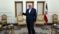 Iranian Foreign Minister Mohammad Javad Zarif gestures as he stands in an office as he meets with the diplomatic advisor to the French president in the capital Tehran on July 10, 2019. (AFP / ATTA KENARE)