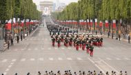 French soldiers march during the Bastille Day military parade down the Champs-Elysees avenue in Paris on July 14, 2019. / AFP / Lionel Bonaventure 