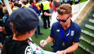 England's Jos Buttler signs his autograph for a fan during the celebrations. (Action Images via Reuters/Andrew Boyers) 
