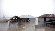 Houses are seen flooded in Kurigram, Bangladesh, July 15, 2019. Reuters
