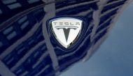 A logo of Tesla Motors on an electric car model is seen outside a showroom in New York, June 28, 2010. Reuters/Shannon Stapleton