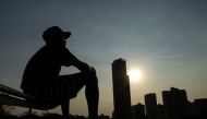 This photo taken on March 14, 2019 shows a silhouette of a boy that was once held at a juvenile detention centre, during an interview with AFP at an unspecified location in Manila. AFP / Noel Celis