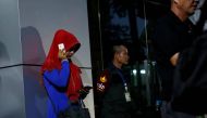 Relatives of victims of human trafficking wait for the sentence after an army general, two provincial politicians and police officers were among the 46 people held guilty in a court in Bangkok, Thailand, July 19, 2017. Reuters/Jorge Silva