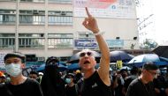 People demonstrate outside the police station during a protest against the Yuen Long attacks in Yuen Long, New Territories, Hong Kong, China July 27, 2019. REUTERS/Edgar Su