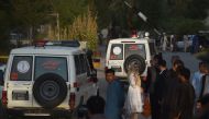 Ambulances bring wounded civilians to the Wazir Akbar Khan hospital following an attack in Kabul on July 28, 2019. At least one person was killed and 13 others wounded in an attack July 28 targeting the Kabul office of the running mate of Afghan President