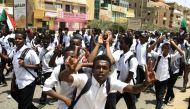 Sudanese students protest in the capital Khartoum on July 30, 2019, a day after teenagers were shot at a rally against shortages of bread and fuel in the town of al-Obeid, about 420 kilometres southwest of the capital. (AFP / Ebrahim HAMID)