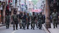 Security personnel patrol along a street in Jammu on August 6, 2019.  / AFP / Rakesh BAKSHI 