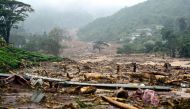 Afile photo of a damaged area is pictured following a landslide in Meppadi, Wayanad district, in the Indian state of Kerala on August 9, 2019.  / AFP / STR 
