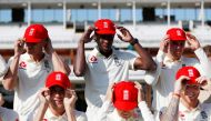 England's Jofra Archer and team mates prepare for a team group photo before nets. (Reuters/Paul Childs)