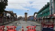 In this file photo taken on August 19, 2019, the clock tower at deserted Lal Chowk is pictured during a security lockdown in Srinagar.  AFP / PUNIT PARANJPE 