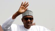 FILE PHOTO: Nigeria's President Muhammadu Buhari greets his supporters after Friday prayers in his hometown Daura, in Katsina State, ahead of the country's presidential election, Nigeria February 15, 2019. REUTERS/Luc Gnago