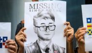 Activists gather outside the British Consulate-General building in Hong Kong on August 21, 2019, following reports that Simon Cheng, a Hong Kong consulate employee had been detained by mainland Chinese authorities on his way back to the city. AFP / Anthon