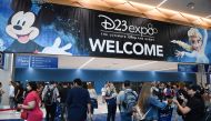 Attendees arrive at the D23 Expo, billed as the