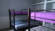 Empty bunk beds sit in a shelter for victims of human trafficking in Tapachula, Mexico, March, 26, 2019. Thomson Reuters Foundation / Christine Murray